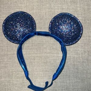 Disney Parks authentic Minnie Mouse blue sparkly ears adjustable headband.
